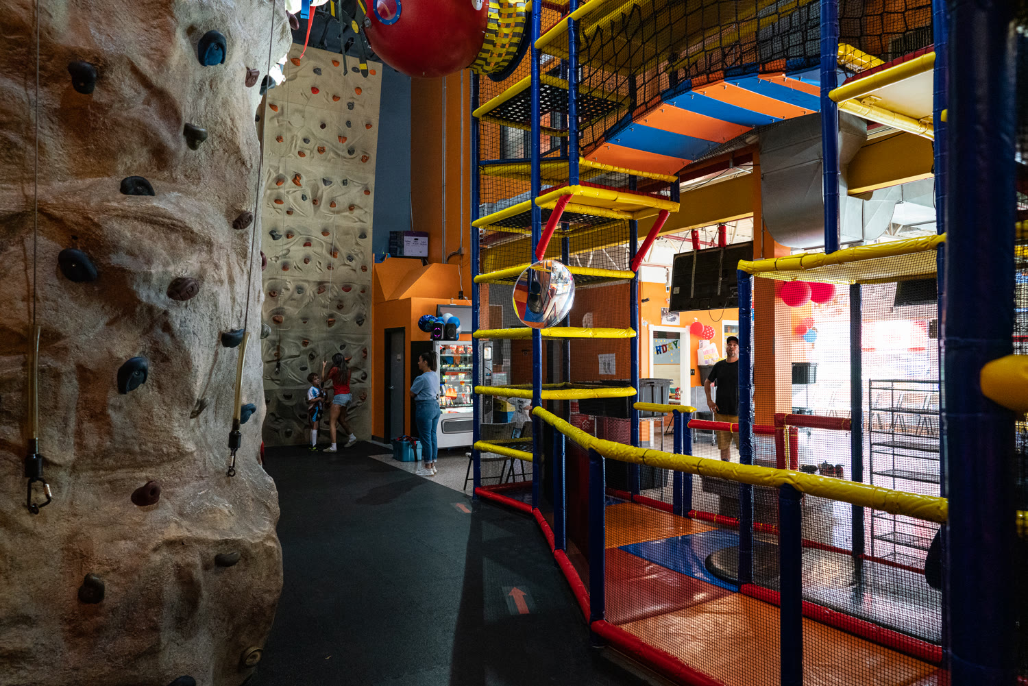 Inside Laserdome — climbing walls and play structure
